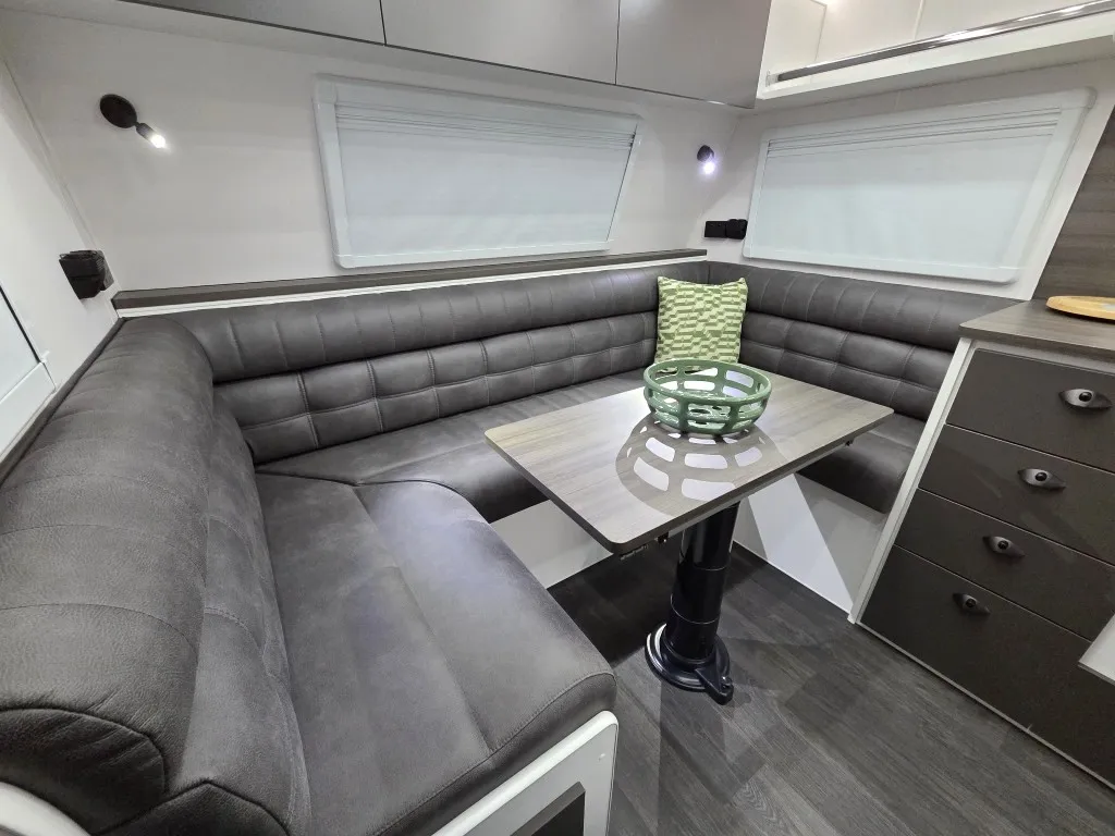 Safari Delta 226 Slide Out dinette with grey upholstered seating and table