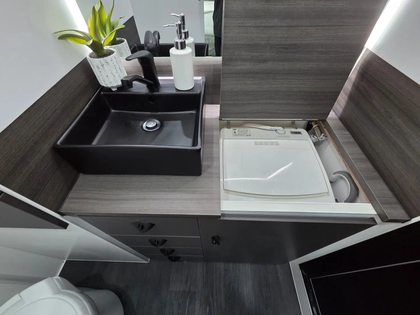 Safari Delta 226 Slide Out ensuite vanity with black basin and timber-look benchtop