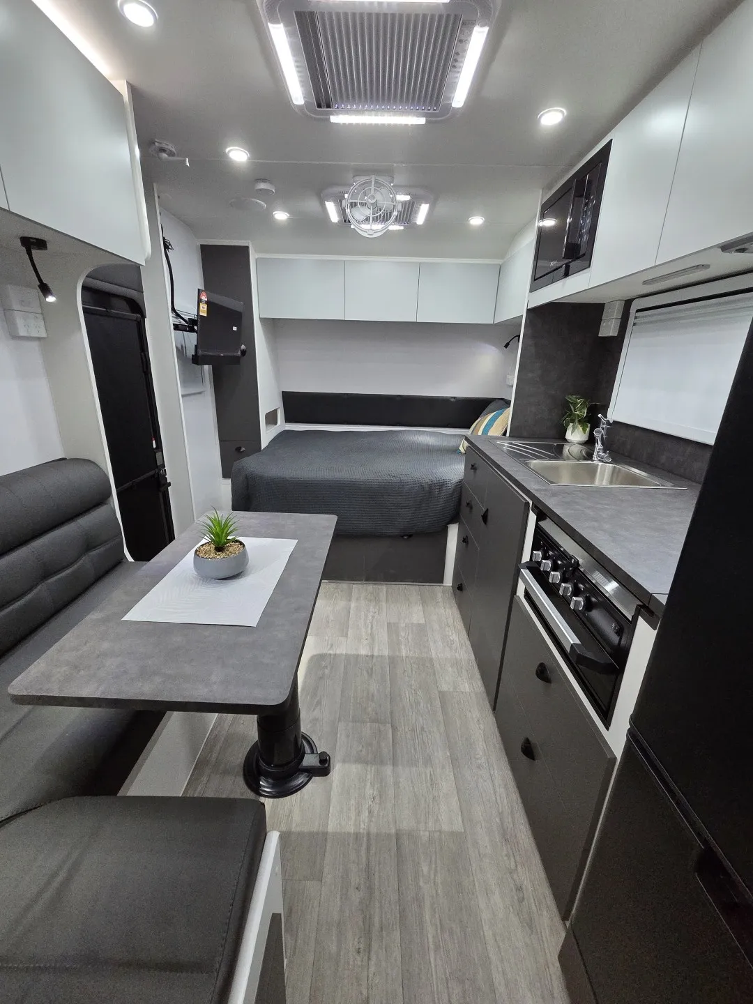 Looking down the length of a Safari Legacy 228, from the dinette to the front bed