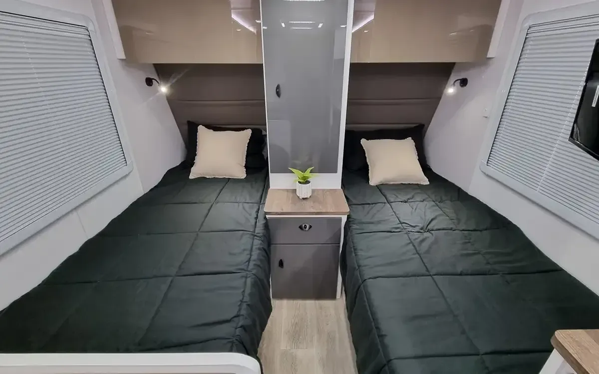 Safari Oasis 176 Single Beds, two single beds with a bedside table between them