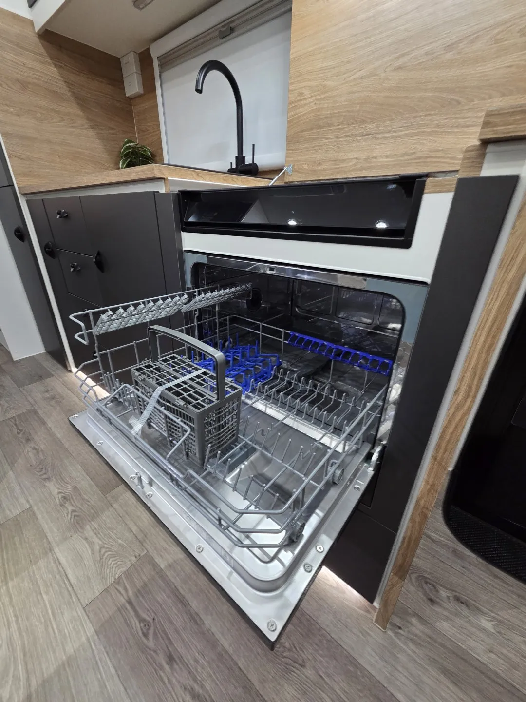 Safari Tuff Roader-X 206 kitchen dishwasher open under the timber benchtop