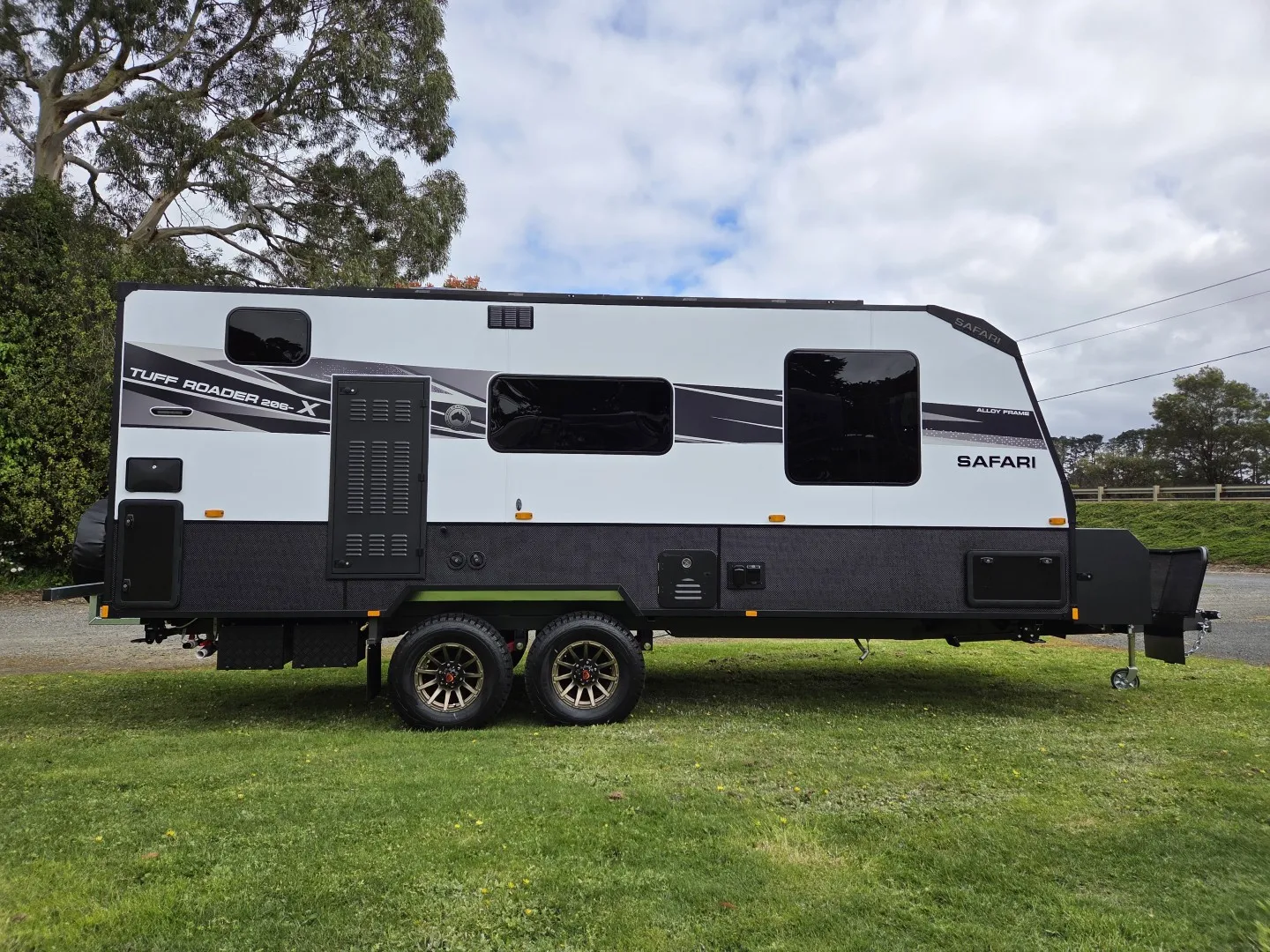 Safari Tuff Roader-X 206 full side profile showing tandem axles and bronze wheels