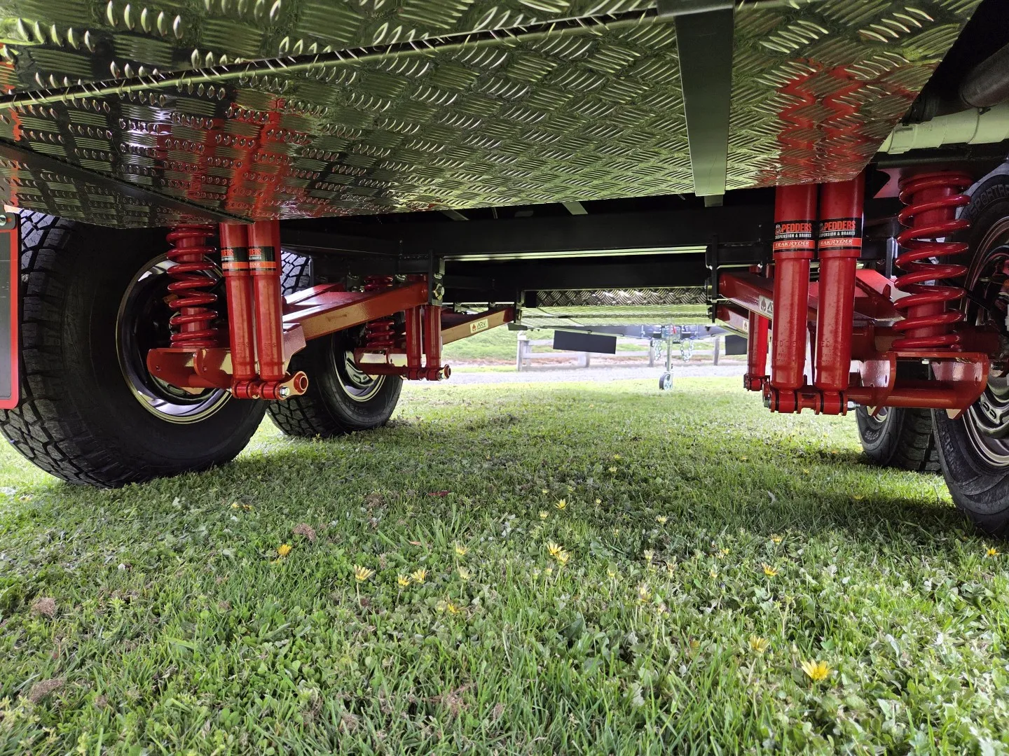 Safari Tuff Roader-X 206 red independent coil suspension under the chassis