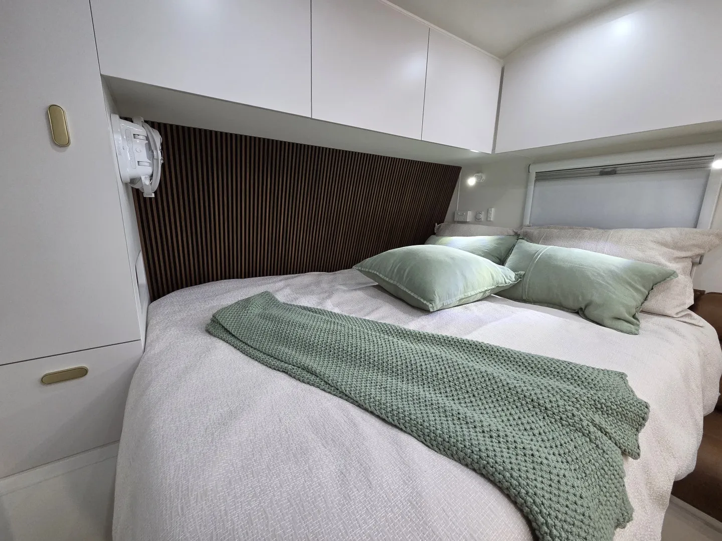 Queen bed with timber slat bedhead in a Safari Tuff Roader-X