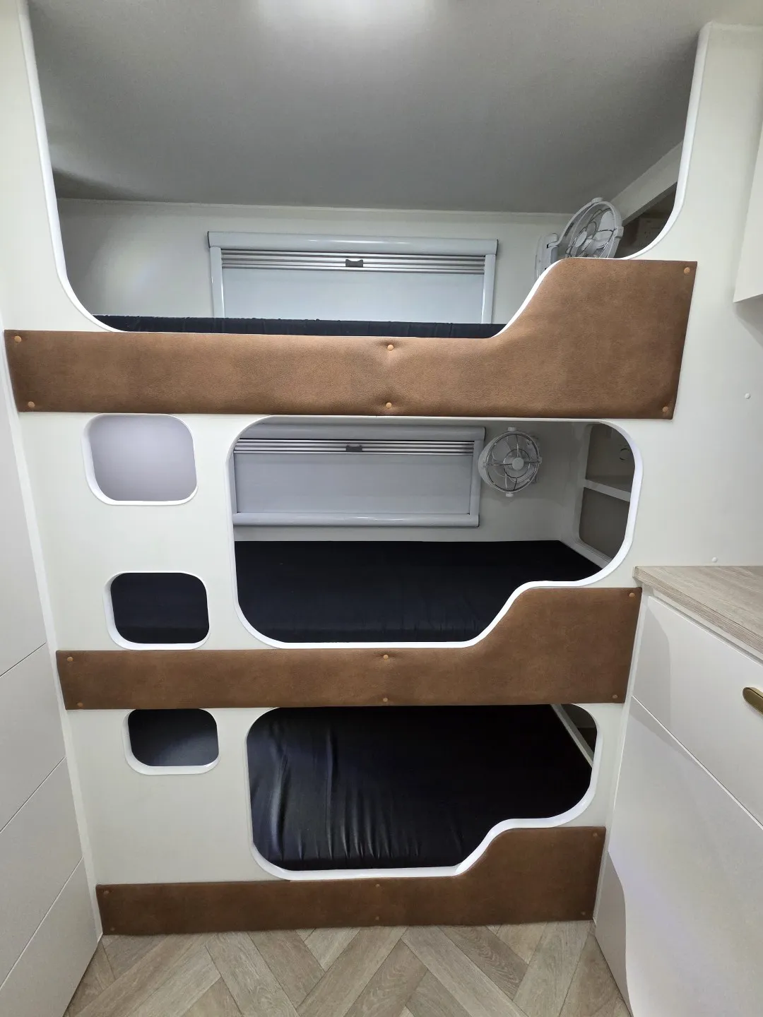 Safari Tuff Roader-X 21 triple bunks with padded rails and reading lights