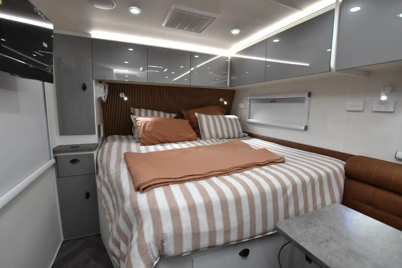 Safari Tuff Roader-X 226 King Bed with tan headboard and overhead cupboards