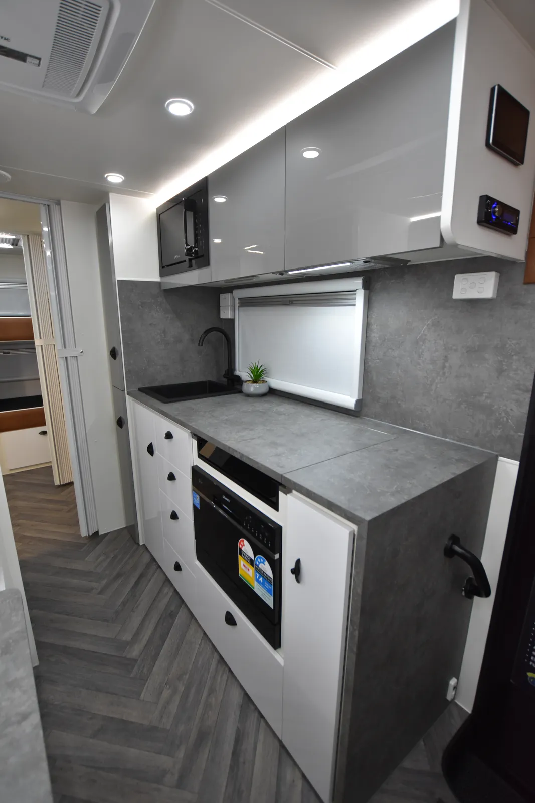 Safari Tuff Roader-X 226 King Bed kitchen with stone-look bench, oven and sink