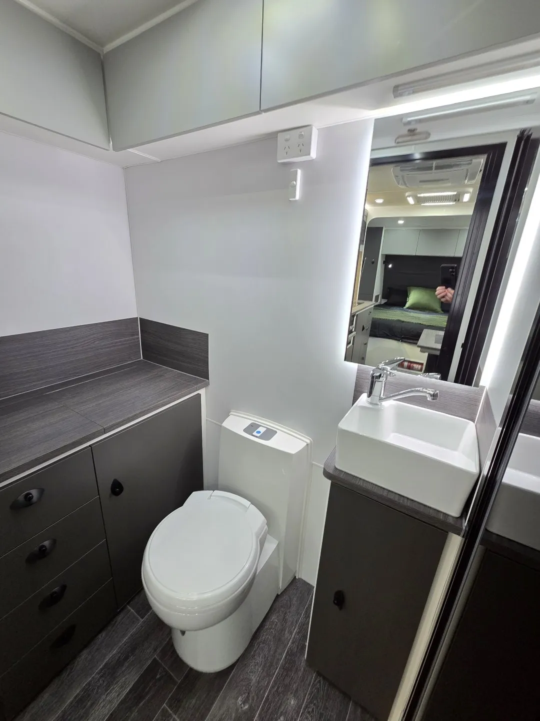 Safari X-Trak 176 ensuite with toilet, vanity and storage cupboards